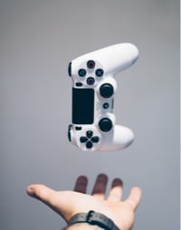 Hand catching playstation controllers